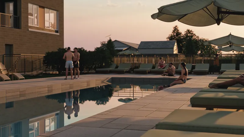 Residents at the pool at dusk